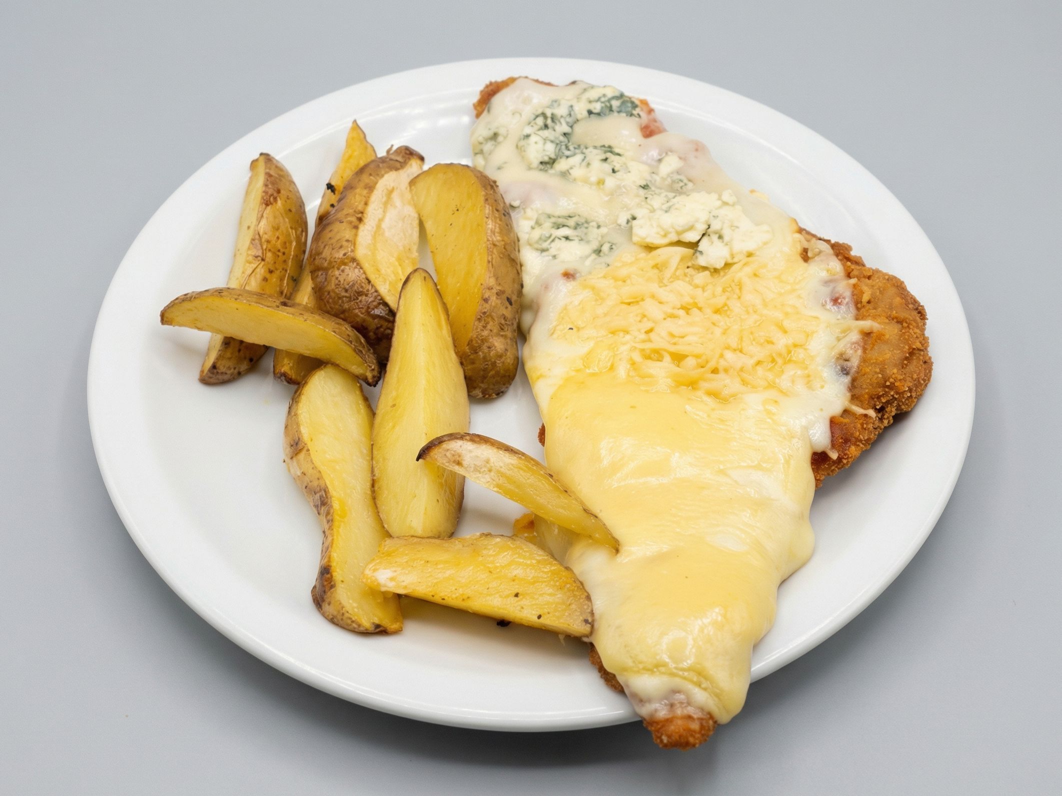 Pizzanesa de pollo martin + papas