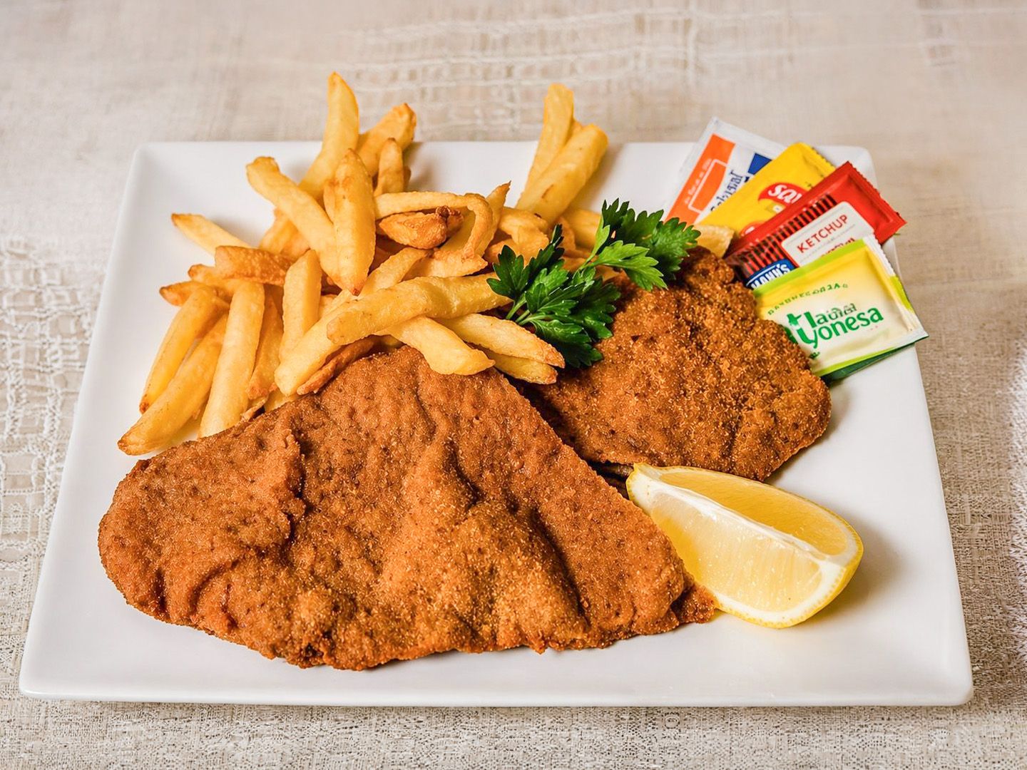 Milanesas común con fritas