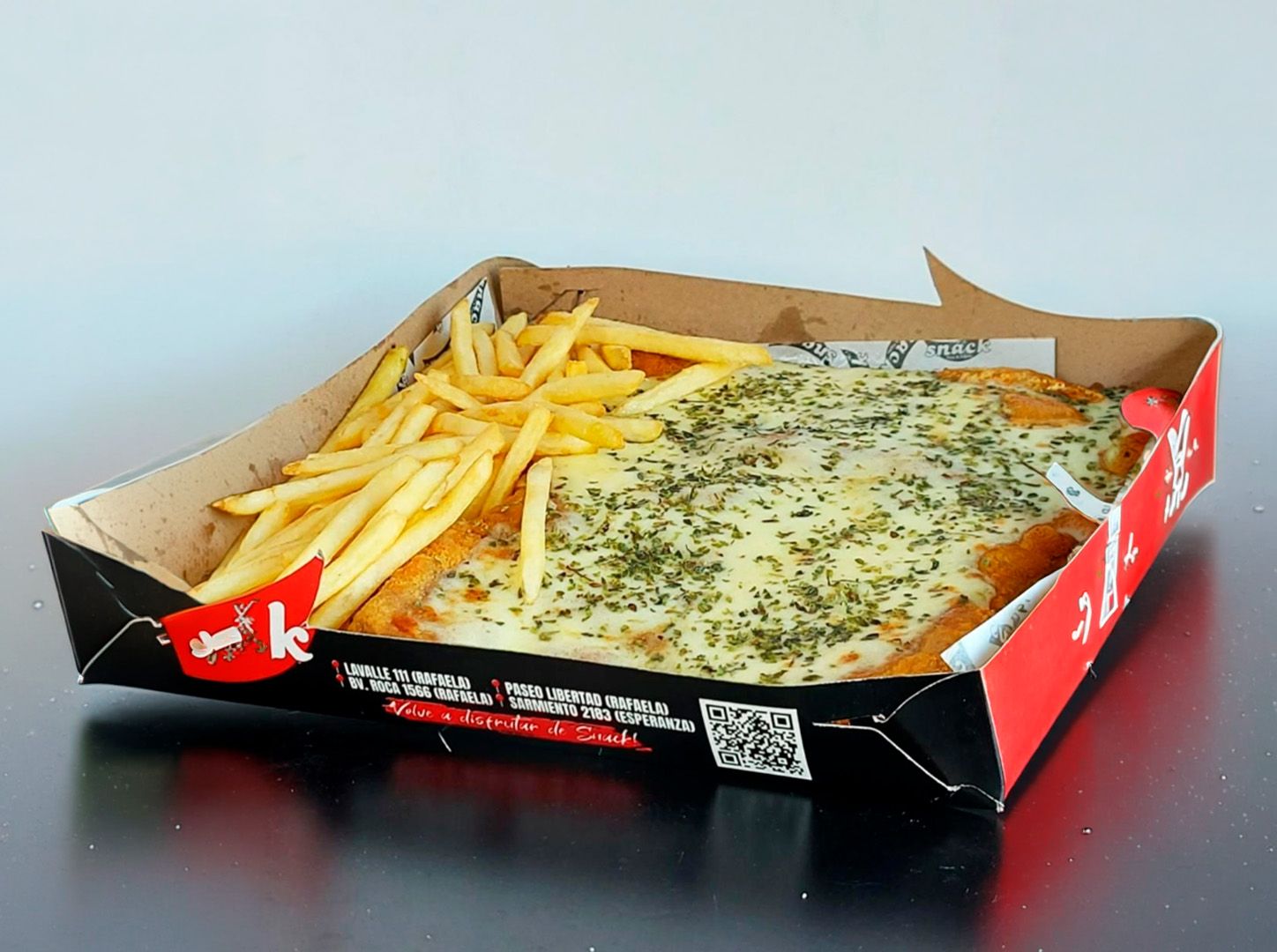 Milanesa para dos muzzarella más fritas