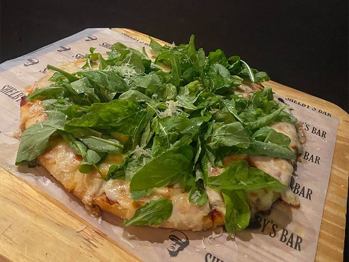 Pizza con rúcula