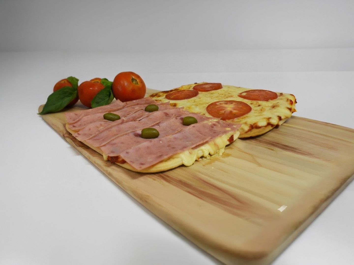 2x pizzas 8p mitad mitad