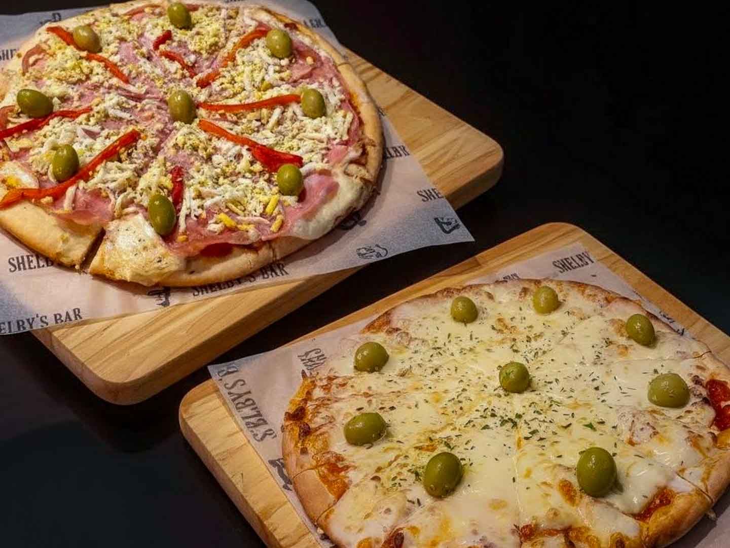 1 pizza muza + 1 pizza espec.