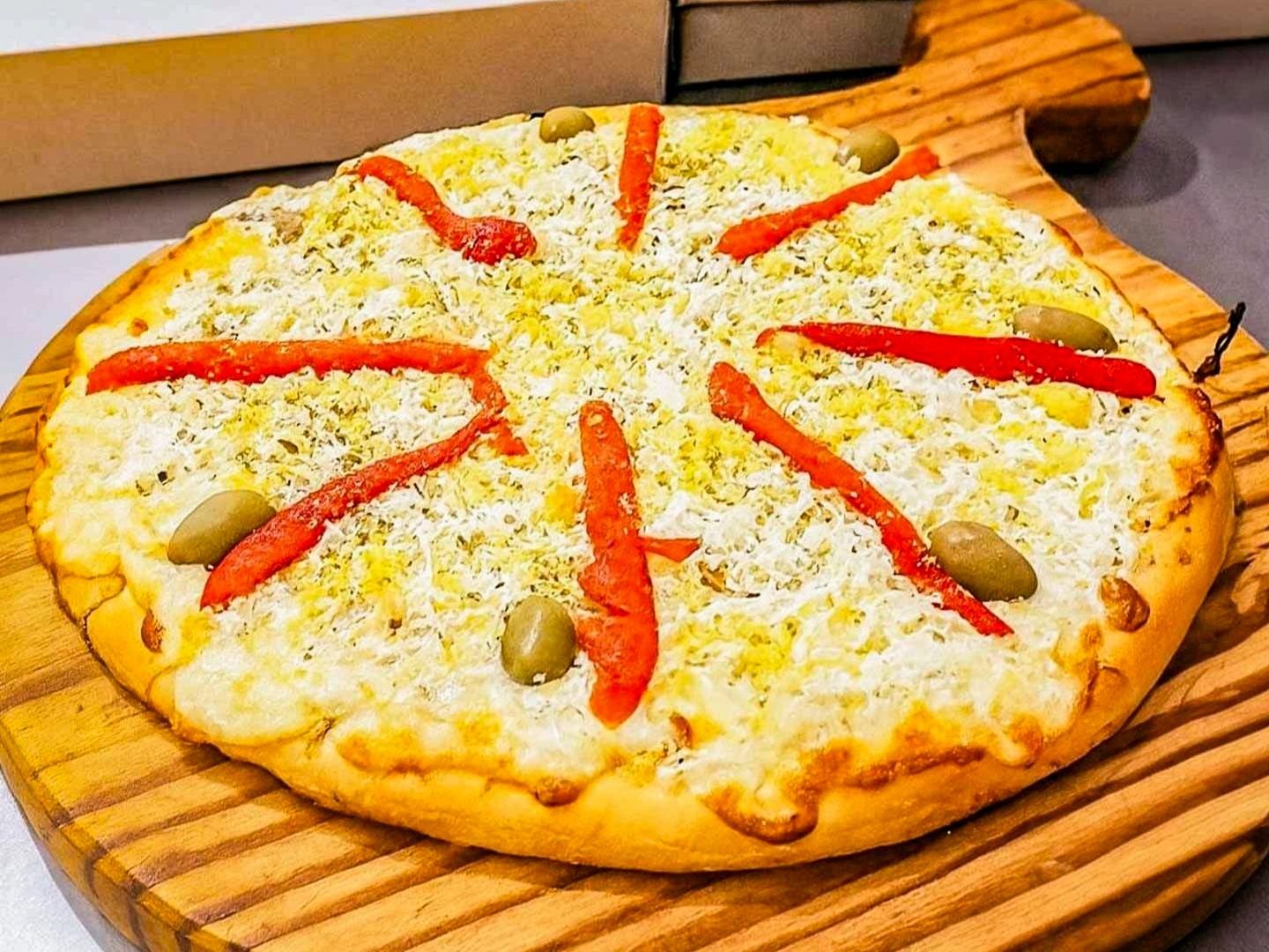 Pizzeta muzzarella con huevo 4p