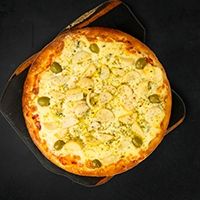 Pizza roquefort con palmitos
