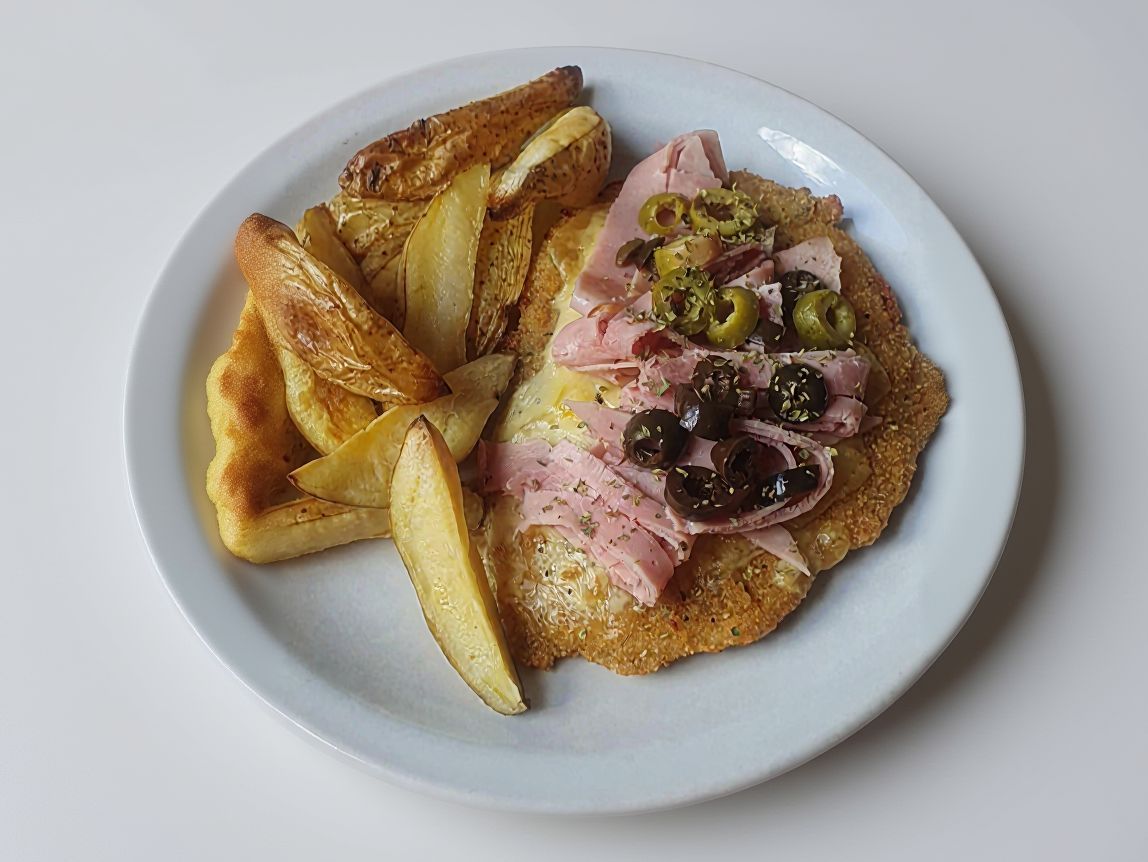 Pizzanesa de pollo facu + papas