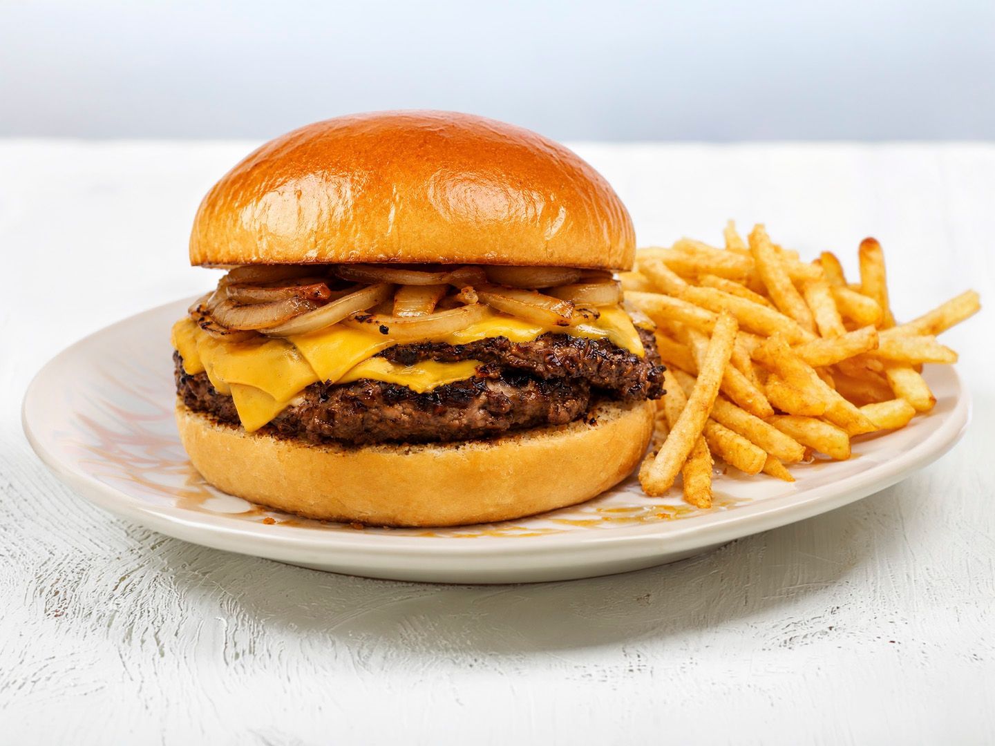 Burger onion slider doble + papas fritas