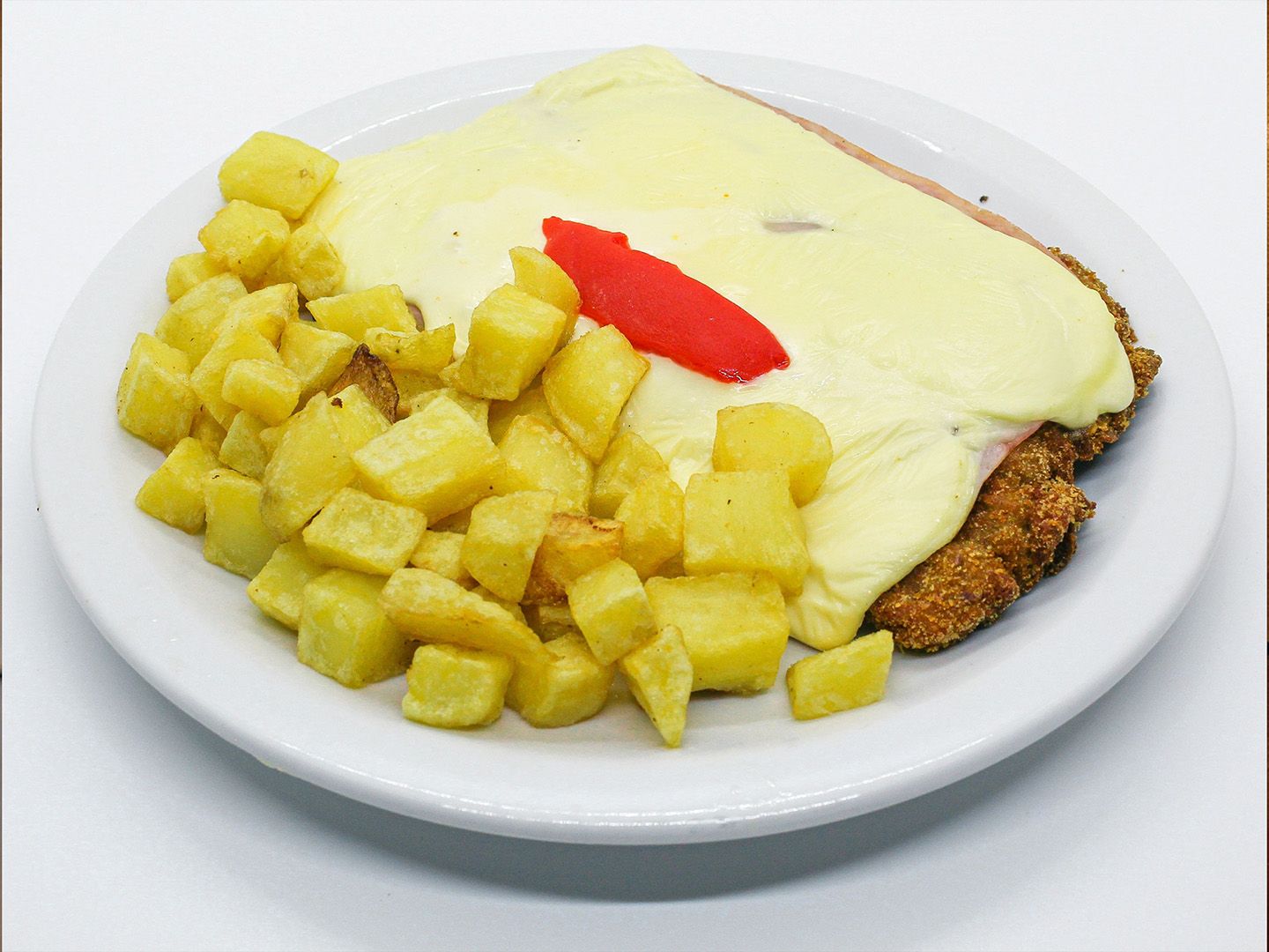 Mila de pollo a la napolitana con guarnición