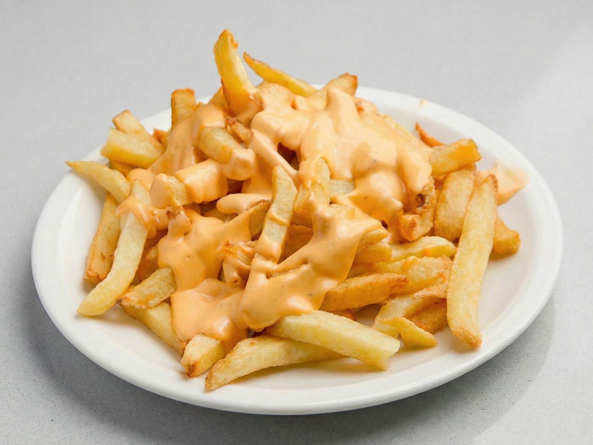 Papas con cheddar