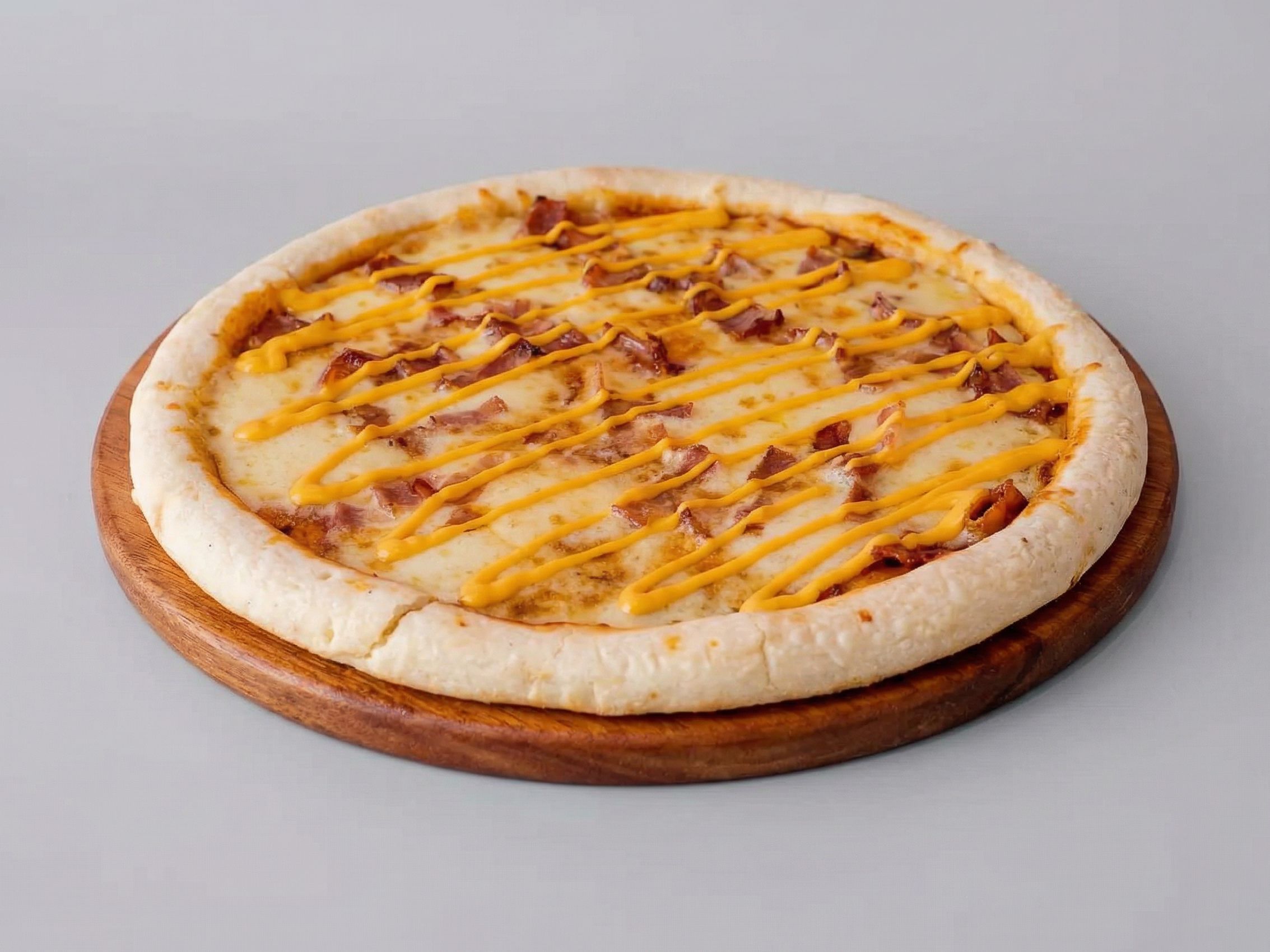 Pizza de panceta y cheddar