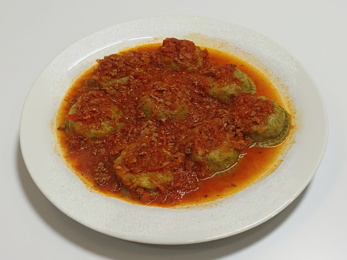 Sorrentinos de verdura con bolognesa