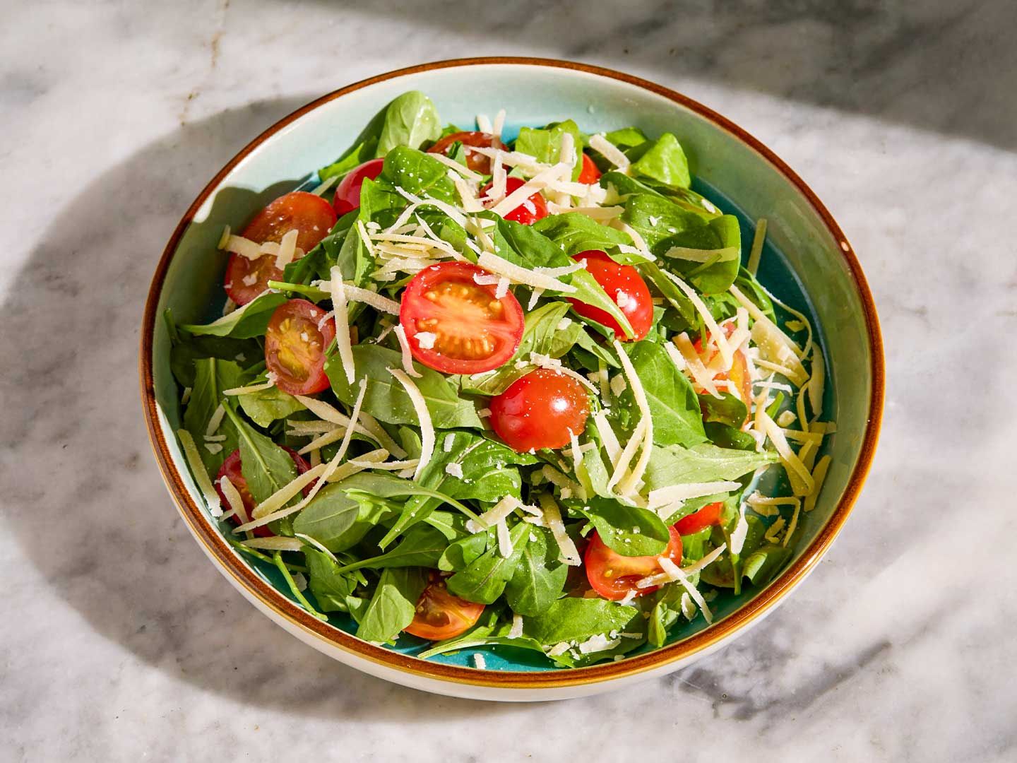 Ensalada De Rucula, Parmesano Y Cherry