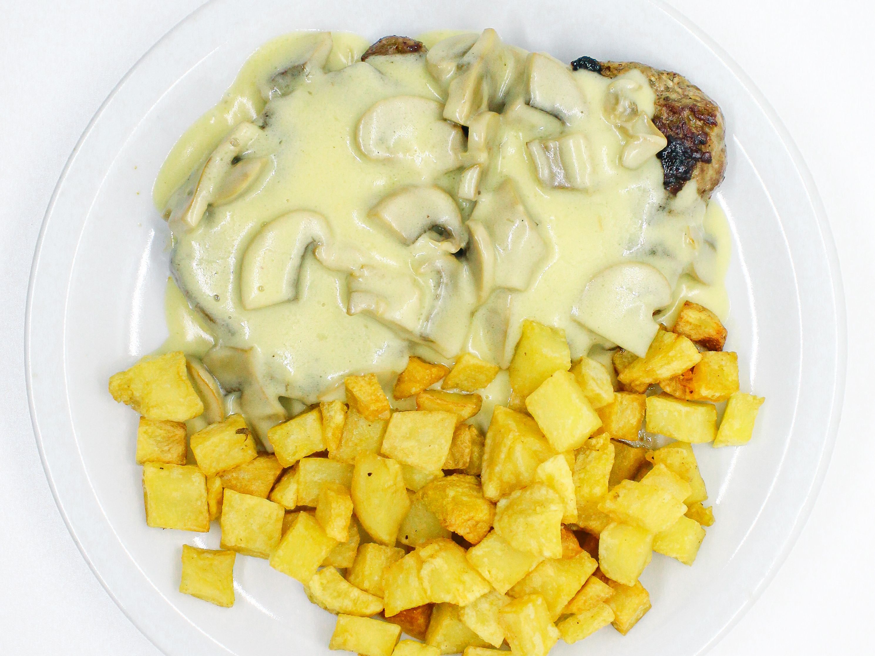 Pollo al champignon con guarnición