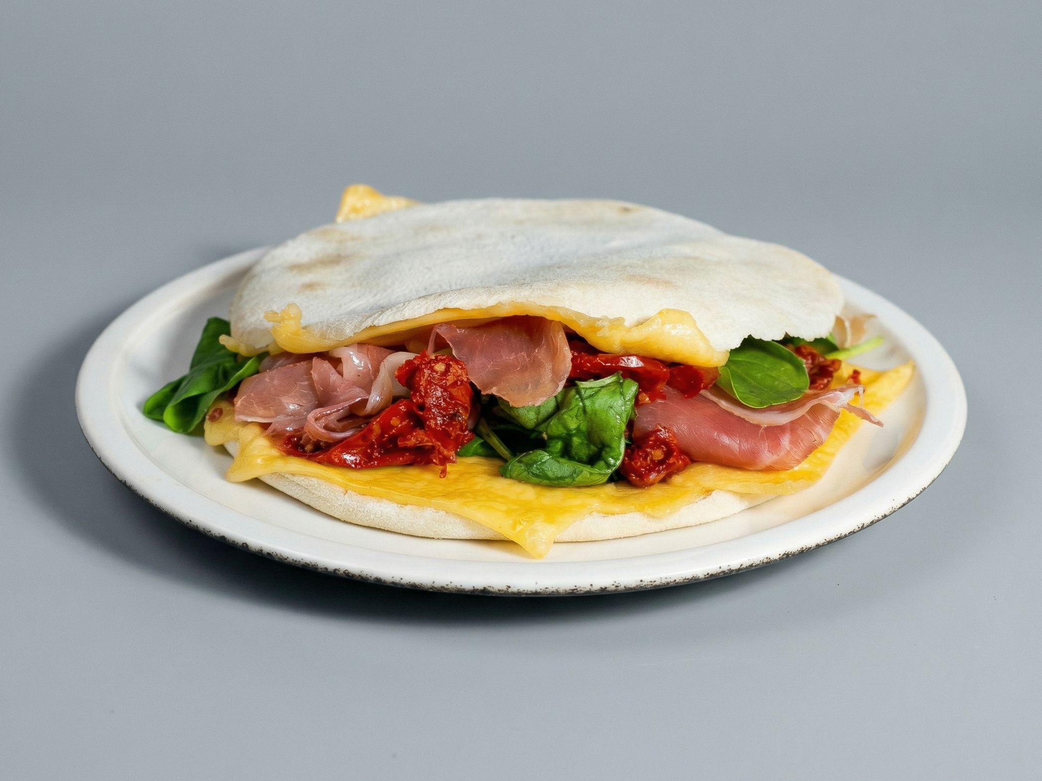 Árabe de jamón crudo